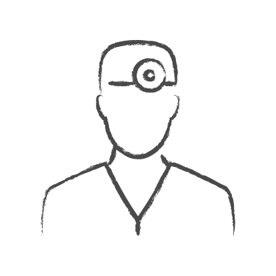 Sylwetka dentysty w czepku lekarskim.